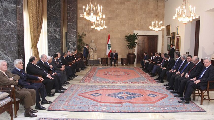 Lebanon's President Michel Suleiman (C) meets with members of "March 14" coalition at the presidential palace in Baabda, near Beirut, June 18, 2013. Lebanon's main Sunni Muslim political party pleaded with the presidency on Tuesday to prevent "state collapse", blaming the Shi'ite Hezbollah group for dragging the country into the war in neighbouring Syria. REUTERS/Dalati Nohra/Handout via Reuters (LEBANON - Tags: POLITICS) ATTENTION EDITORS - THIS IMAGE WAS PROVIDED BY A THIRD PARTY. FOR EDITORIAL USE ONLY. 