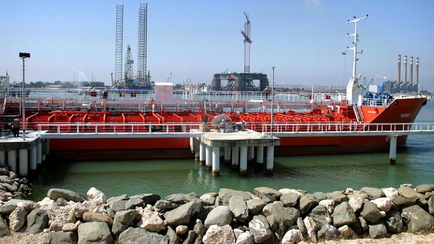A Russian supertanker is anchored by Neka oil terminal, 300 km north-east of [Tehran], during an inauguration ceremony of the first phase of an oil swap project with Iran's Caspian neighbours, April 29, 2004. [ Under the project Iran will take crude from Russia, Kazakhstan and Turkmenistan and transfer them through pipelines to refineries in the cities of Tehran and Tabriz.] - RTXMLA4