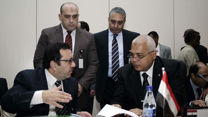 Egyptian Water Minister Mohamed Abdul Muttalib listens to a member of his delegation during tripartite talks about Ethiopia's Great Renaissance Dam on January 4, 2014 in the Sudanese capital, Khartoum. The talks are being attended by the irrigation ministers of Ethiopia, Egypt and Sudan and are set to last for three days. AFP PHOTO EBRAHIM HAMID        (Photo credit should read EBRAHIM HAMID/AFP/Getty Images)
