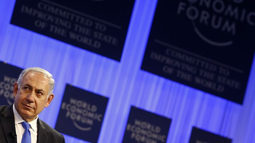 Israel's Prime Minister Benjamin Netanyahu attends a session at the annual meeting of the World Economic Forum (WEF) in Davos January 23, 2014.                     REUTERS/Ruben Sprich (SWITZERLAND  - Tags: POLITICS BUSINESS)   - RTX17R9U