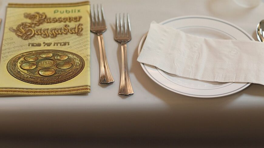 MIAMI BEACH, FL - MARCH 25:  A table is set for a  community Passover Seder at Beth Israel synagogue  on March 25, 2013 in Miami Beach, Florida. The community Passover Seder that served around 150 people has been held for the past 30 years and is welcome to anyone in the community that wants to commemorate the emancipation of the Israelites from slavery in ancient Egypt.  (Photo by Joe Raedle/Getty Images)