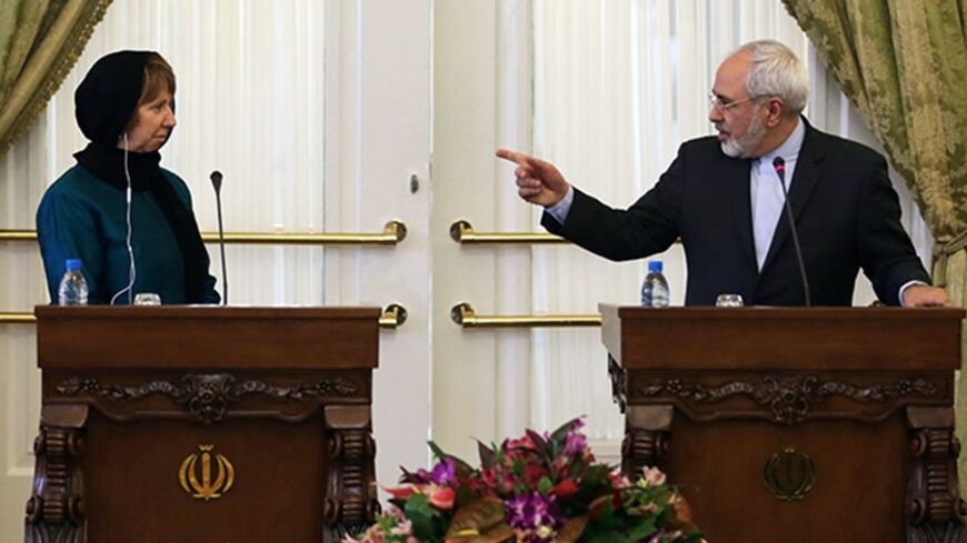 EU foreign affairs chief Catherine Ashton (L), who coordinates nuclear talks between Tehran and world powers and Iranian Foreign Minister Mohammad Javad Zarif give a joint press conference following a meeting on March 9, 2014 in Tehran. Ashton is in Iran for top-level meetings with officials who are pursuing a track of talks they hope will eventually end international pressure and suspicions over Tehran's nuclear programme. AFP PHOTO / ATTA KENARE (Photo credit should read ATTA KENARE/AFP/Getty Im