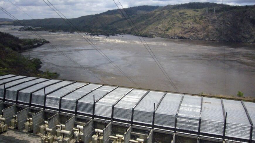 An ariel view of the semi-functional Inga dam on the Congo River October 22, 2006. With a flow second only to the Amazon, the mighty Congo river spews forth 1.5 million cubic feet (42.5 million litres) into the Atlantic every second. Experts say it could generate over 40,000 megawatts (MW) of electricity -- more than twice the projected capacity of China 's massive Three Gorges Dam, and a major step to keeping up with fast-growing demand for electricity in Africa and beyond. Picture taken October 22, 2006. 