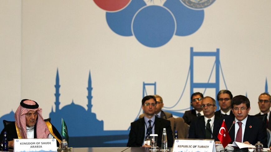 Saudi Arabia's Foreign Minister Prince Saud al-Faisal (L) and Turkey's Foreign Minister Ahmet Davutoglu (R) attend the Fourth Ministerial Meeting of Turkey-Gulf Cooperation Council (GCC) in Istanbul January 28, 2012.   REUTERS/Osman Orsal (TURKEY - Tags: POLITICS) - RTR2WZJV