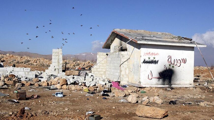 A view shows an empty Syrian Army post at the outskirt of the Syrian village of Rankus, near the Lebanese-Syrian borders, January 3, 2013. A Lebanese citizen who crossed into Syria through a mountainous frontier region said the army appeared to have withdrawn from several border posts and villages in the area. Rebels controlled a line of border towns and villages north of the capital Damascus, stretching about 40 km (25 miles) from Yabroud south to Rankus, said the man, who did not want to be named and visi