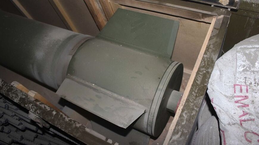 A rocket is seen on a ship seized by the Israeli navy in the Red Sea in this handout picture released by the Israel Defence Forces (IDF) March 5, 2014. The Israeli navy seized the ship in the Red Sea on Wednesday that was carrying dozens of advanced Iranian-supplied rockets made in Syria that were intended for Palestinian militants in the Gaza Strip, the military said. REUTERS/IDF/Handout via Reuters (MILITARY) ATTENTION EDITORS - FOR EDITORIAL USE ONLY. NOT FOR SALE FOR MARKETING OR ADVERTISING CAMPAIGNS. 