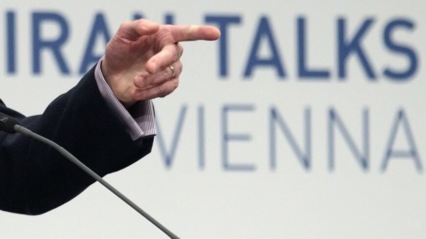 Michael Mann, spokesman of European Union foreign policy chief Catherine Ashton, points as he addresses a news conference in Vienna March 18, 2014. Iran and six world powers - the United States, Russia, France, Germany, Britain and China, will try to make headway toward resolving their nuclear dispute in talks that started in Vienna on Tuesday, with Western officials hoping the challenge will not be made even more difficult by the Ukraine crisis. The United States and European Union have imposed sanctions i