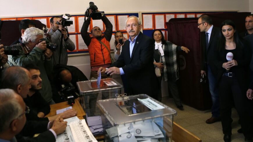 Main opposition Republican People's Party's (CHP) chief Kemal Kilicdaroglu casts his vote during municipal elections at a polling station in Ankara March 30, 2014. REUTERS/Umit Bektas (TURKEY - Tags: POLITICS ELECTIONS) - RTR3J6RM