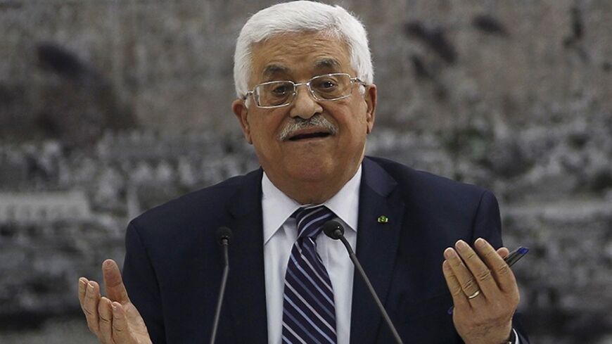 Palestinian President Mahmoud Abbas attends a meeting with Palestinian leadership in the West Bank City of Ramallah April 1, 2014. Abbas signed more than a dozen international conventions on Tuesday citing anger at Israel's delay of a prisoner release, in a move jeopardised U.S. efforts to salvage fragile peace talks. REUTERS/Mohamad Torokman (WEST BANK - Tags: POLITICS) - RTR3JIRK