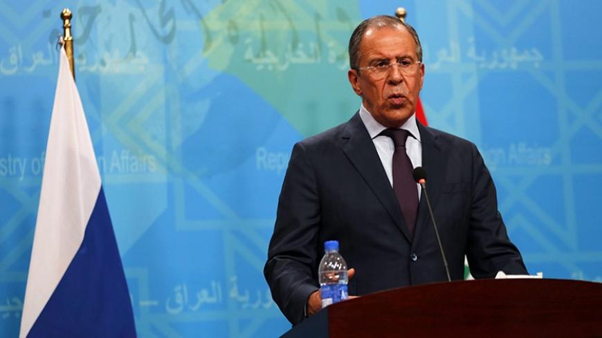 Russia's Foreign Minister Sergei Lavrov speaks during a joint news conference with Iraq's Foreign Minister Hoshyar Zebari in Baghdad February 20, 2014.  REUTERS/Thaier al-Sudani (IRAQ - Tags: POLITICS) - RTX196LB