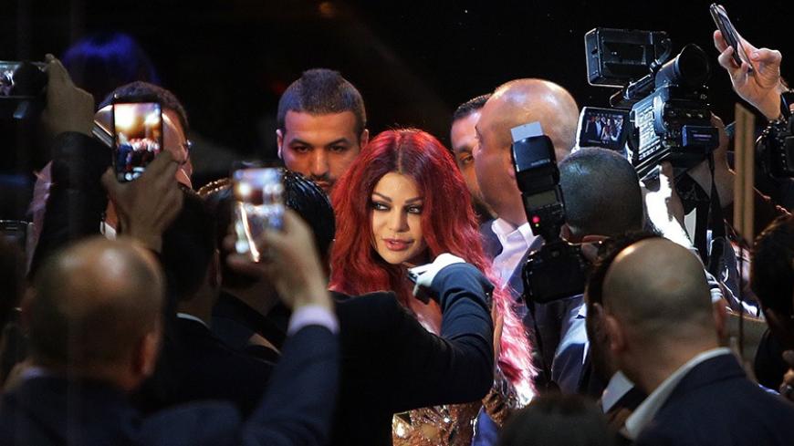 Lebanese pop star Haifa Wehbe arrives for the Premiere of he movie 'Halawet Rooh' at a movie theatre in the town of Dbayeh, North of Beirut on April 8 , 2014. AFP PHOTO/JOSEPH EIDEID        (Photo credit should read JOSEPH EID/AFP/Getty Images)