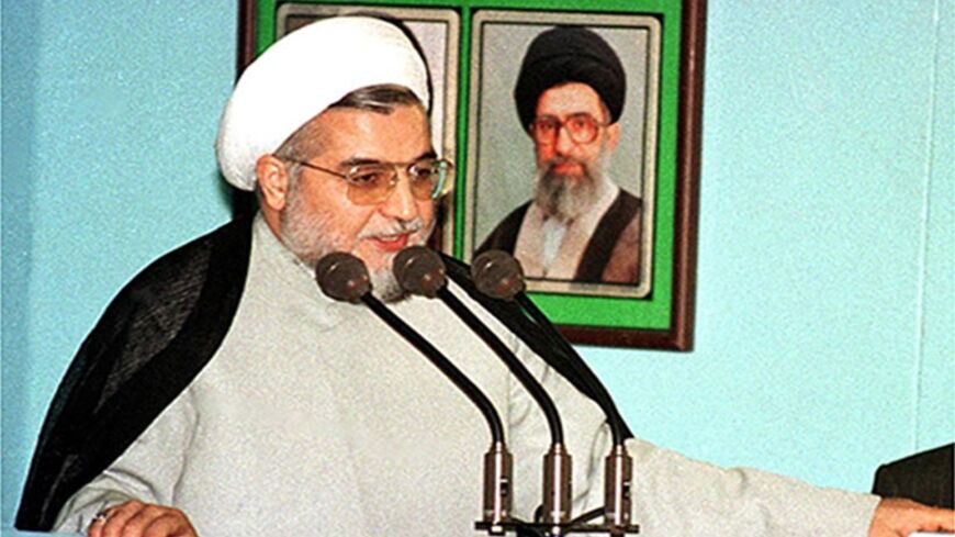 TEHRAN, IRAN:  Conservative Hassan Rouhani, deputy speaker of the parliament and secretary of Iran's top security body, the Supreme National Security Council, addresses thousands of pro-regime demonstrators who gathered 14 July 1999 at Tehran University, the main focus of six days of student protests which have shaken Iran's Islamic regime. Rouhani said the students arrested during the past two days of violent protests will be tried as "counter-revolutionaries". (Photo credit should read ATTA KENARE/AFP/Get