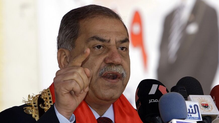 Iraqi secular Sunni politician Mithal al-Alusi speaks during an election campaign rally ahead of March 7 parliamentary elections in Baghdad February 27, 2010.  REUTERS/Saad Shalash (IRAQ - Tags: ELECTIONS POLITICS) - RTR2AZUB