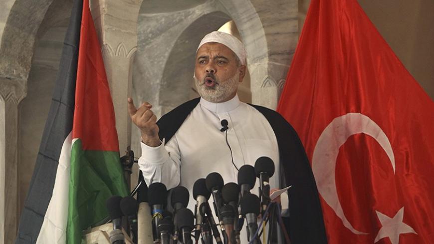 Senior Hamas leader Ismail Haniyeh speaks about Israel's seizure of a Gaza-bound aid ship, during Friday prayers at al-Omari mosque in Gaza City June 4, 2010. Israeli marines stormed the Turkish aid ship bound for Gaza on Monday and at least nine pro-Palestinian activists were killed, triggering a diplomatic crisis and an emergency session of the U.N. Security Council. REUTERS/Mohammed Salem (GAZA - Tags: POLITICS CIVIL UNREST) - RTR2ER1A