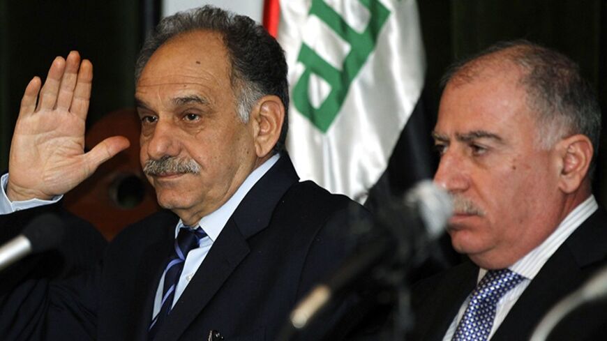 Iraqi Sunni Deputy Prime Minister Saleh al-Mutlaq (L) and Iraqiya Sunni speaker of parliament Osama al-Nujaifi hold a news conference for the seniors of Iraqiya bloc in Baghdad January 18, 2012. REUTERS/Mohammed Ameen (IRAQ - Tags: POLITICS) - RTR2WGNT