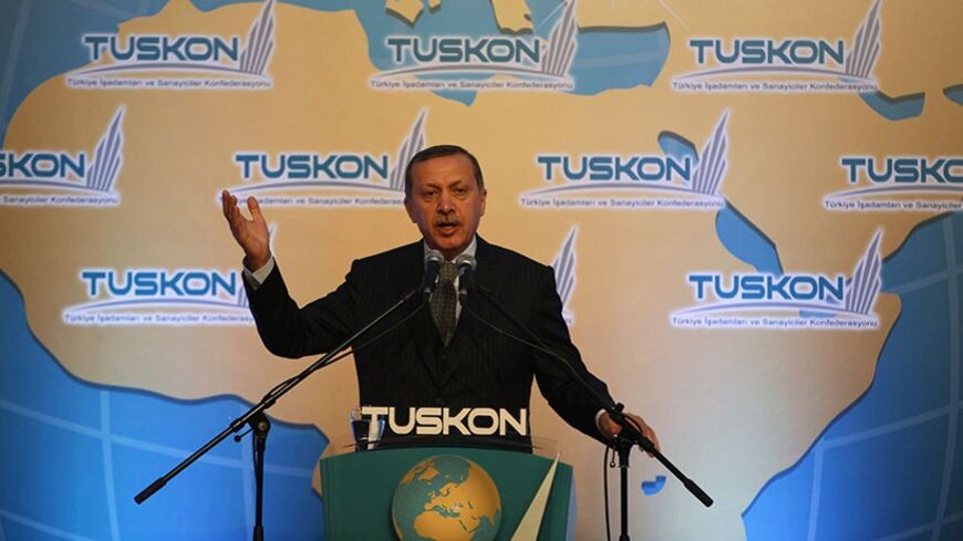 Turkey's Prime Minister Tayyip Erdogan makes his address at the Turkish Confederation of Businessmen and Industrialists (TUSKON) General Assembly in Istanbul March 31, 2012. REUTERS/Murad Sezer (TURKEY - Tags: BUSINESS POLITICS) - RTR3056D