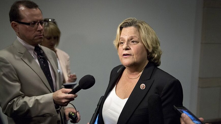 U.S. Representative Ileana Ros-Lehtinen (R-FL) speaks to the media before attending a closed meeting for members of Congress on the situation in Syria at the U.S. Capitol in Washington September 1, 2013. U.S. Secretary of State John Kerry said on Sunday tests showed that sarin nerve gas was used in a deadly August 21 chemical attack near Damascus as he sought to build the case to convince skeptical lawmakers to authorize a military strike against the Syrian government. REUTERS/Joshua Roberts    (UNITED STAT