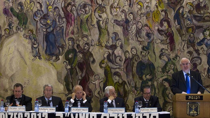 Winners of the 2012 Wolf Prize listen to Knesset Speaker Reuven Rivlin's speech during an award ceremony in the Knesset (Israeli parliament) in Jerusalem on May 13, 2012. Winners (L-R); US Paul Alivisatos in Chemistry, from University of California at Berkeley, US Charles Lieber in Chemistry from Harvard University, US Michael Aschbacher in Mathematics, from California institute of technology, US Luis Caffarelli in Mathematics, from University of Texas at Austin, Israeli Jacob D. Bekenstein in Physics, from