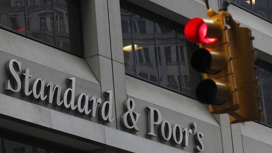 A view shows the Standard & Poor's building in New York's financial district February 5, 2013. The U.S. government is seeking more than $5 billion in a lawsuit against rating agency Standard & Poor's over mortgage bond ratings, U.S. Attorney General Eric Holder said on Tuesday. The civil suit against S&P and its parent McGraw-Hill Cos Inc is the first federal enforcement action against a credit rating agency over alleged illegal behavior related to the 2007-2009 U.S. financial crisis. REUTERS/Brendan McDerm