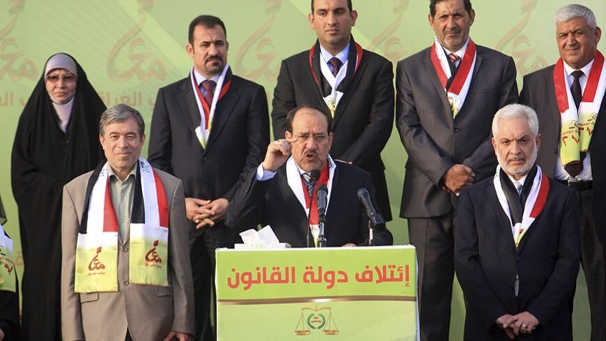 Iraq's Prime Minister Nuri al-Maliki speaks to his supporters during a ceremony to announce his election platform as well as promote candidates of State of Law coalition in Kerbala, southwest of Baghdad, April 17, 2014. REUTERS/Mushtaq Muhammed (IRAQ - Tags: ELECTIONS POLITICS) - RTR3LQ81