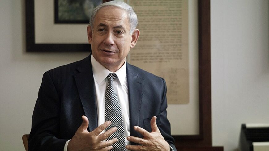 Israeli Prime Minister Benjamin Netanyahu delivers his speech during a news conference in the Independence Hall of Israel in Tel Aviv May 1, 2014. Netanyahu said on Thursday he would seek to enact a law to define Israel as a Jewish state, a step certain to raise opposition from Arab citizens who make up a fifth of the population. REUTERS/Dan Balilty/Pool (JERUSALEM - Tags: POLITICS) - RTR3NELV
