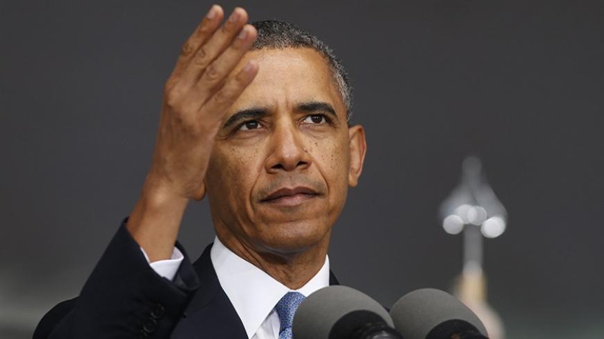 U.S. President Barack Obama arrives for the commencement ceremony at the United States Military Academy at West Point, New York, May 28, 2014. Obama's commencement address here is the first in a series of speeches that he and top advisers will use to explain U.S. foreign policy in the aftermath of conflicts in Iraq and Afghanistan and lay out a broad vision for the rest of his presidency.

REUTERS/Kevin Lamarque  (UNITED STATES - Tags: POLITICS MILITARY) - RTR3R8NG