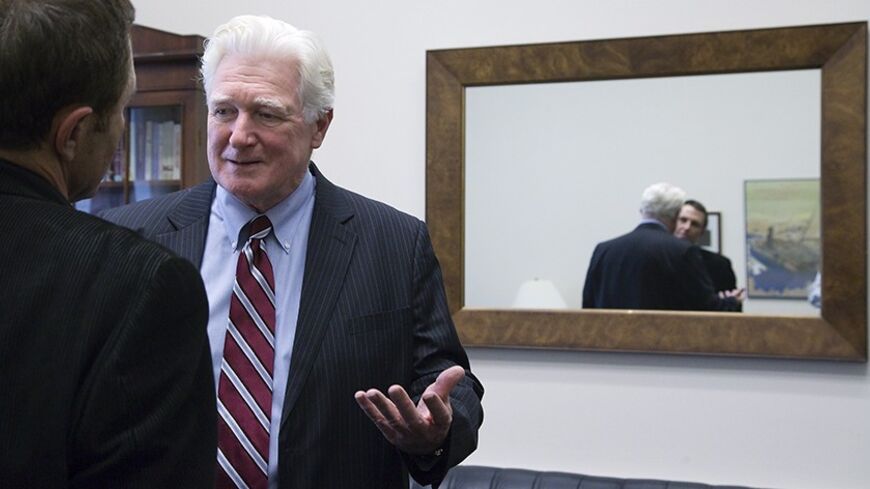 U.S. Representative Jim Moran (D-VA) talks to a television reporter during interviews in his office on Capitol Hill in Washington, January 15, 2014. Moran, a 12-term Virginia liberal, became on Wednesday the third member of his party this week to announce he will not seek re-election in November. REUTERS/Jonathan Ernst    (UNITED STATES - Tags: POLITICS) - RTX17FDA