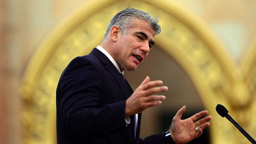 Israel's Financial Minister Yair Lapid adresses the conference of "Jewish life and anti-semitism in contemporary Europe" in the Upper House of the parliament building on October 1, 2013 in Budapest, Hungary. The two-day conference was organized by the Tom Lantos Institute (TLI) and supported by the Hungarian Ministry of Foreign Affairs and addresses relevant issues and concerns of European Jewish communities today. AFP PHOTO / ATTILA KISBENEDEK