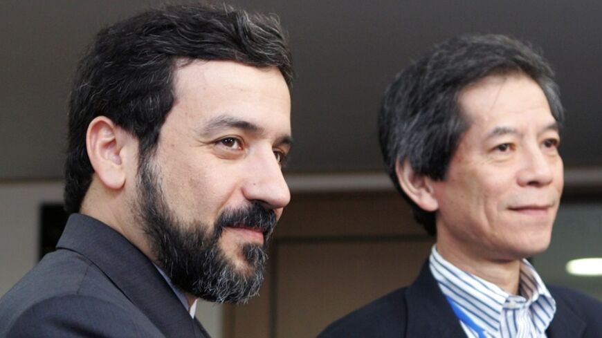 Iran's Deputy Foreign Minister Abbas Araghchi (L) meets Japanese Deputy Minister for Foreign Affairs Tsuneo Nishida before their talks at the Foreign Ministry in Tokyo September 1, 2006. REUTERS/Toru Hanai (JAPAN) - RTR1GVI3