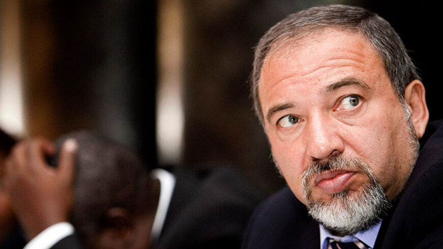 Israel's Foreign Minister Avigdor Liberman attends a meeting with the business community in Uganda's capital Kampala, September 10, 2009. Lieberman, accompanied by business and military delegation, is on an official African visit to Ethiopia, Kenya, Ghana, Uganda, and Nigeria. REUTERS/James Akena (UGANDA POLITICS BUSINESS) - RTR27O1U