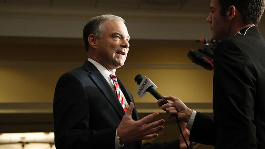 Democratic U.S. Senate candidate Tim Kaine (D-VA) does a series of interviews at the site of his election-night party during the U.S. presidential election in Richmond, Virginia November 6, 2012.   REUTERS/Jonathan Ernst    (UNITED STATES - Tags: POLITICS ELECTIONS USA PRESIDENTIAL ELECTION) - RTR3A32N