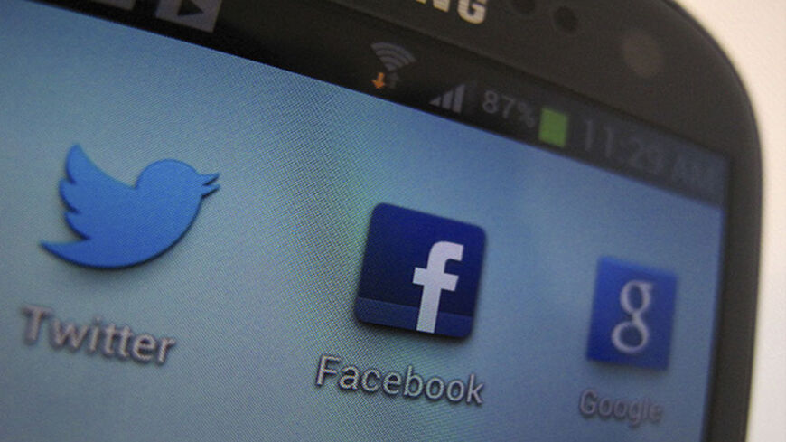 A Facebook icon is shown on a Samsung Galaxy III mobile phone in this photo illustration in Encinitas, California, January 30, 2013. Facebook Inc's advertising business grew at its fastest clip since before the company's May initial public offering, helping the company's revenue expand 40 percent to $1.585 billion. Facebook has ramped up its online advertising services in recent months, putting a greater emphasis on mobile ads and introducing capabilities that let marketers target Facebook users based on th