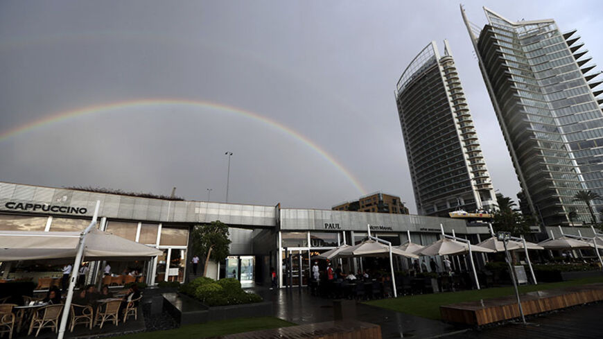 A rainbow is seen over Zaytouna Bay in Beirut May 21, 2014.  REUTERS/Hasan Shaban (LEBANON - Tags: ENVIRONMENT) - RTR3Q94Q