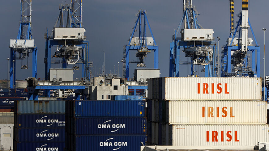 Empty and disused Islamic Republic of Iran Shipping Lines (IRISL Group) containers are seen at Malta Freeport in the Port of Marsaxlokk outside Valletta February 10, 2012.  The IRISL ships and containers are key parts in an international cat-and-mouse game: Iran's attempt to evade the trade sanctions tightening around it. Washington and European capitals want to stop or slow Iran's nuclear programme. They believe that IRISL, which moves nearly a third of Iran's exports and imports and is central to the coun