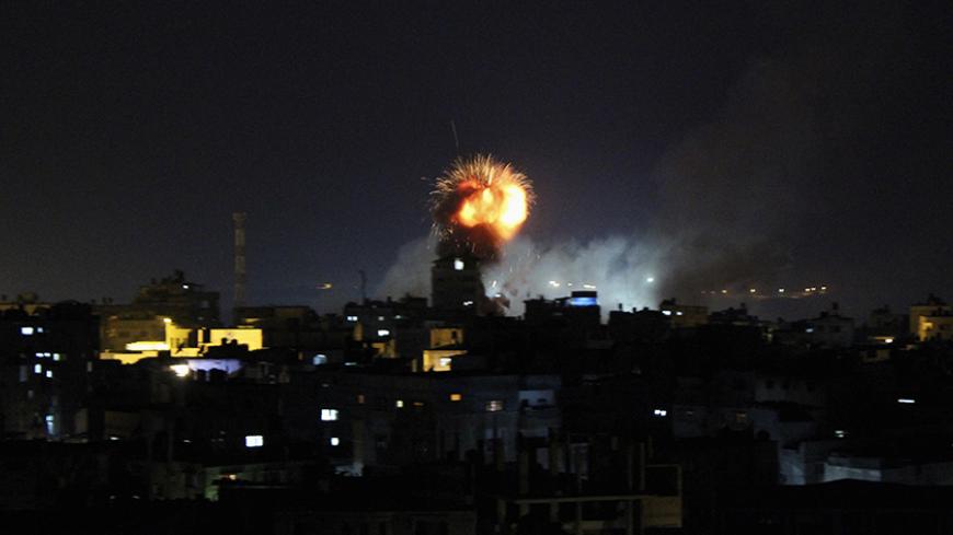 Smoke and flames are seen following what witnesses said was an Israeli air strike in Rafah, in the southern Gaza Strip July 11, 2014. Israel pressed on for a fourth day with its Gaza offensive on Friday, striking the Hamas-dominated enclave from air and sea, as Palestinian militants kept up rocket attacks deep into the Jewish state. At least 79 Palestinians, most of them civilians, have been killed in the offensive, which Israel says it launched to end persistent rocket attacks on its civilian population, s
