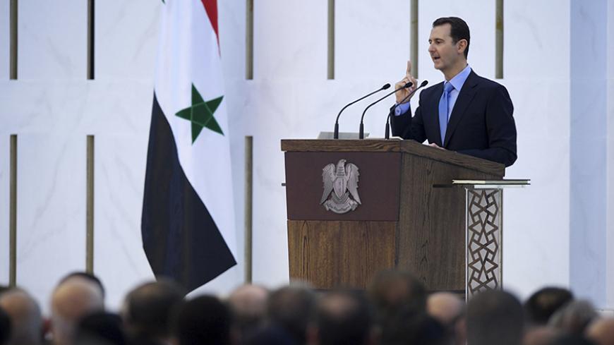 Syria's President Bashar al-Assad delivers a speech after being sworn in for a new seven-year term, at al-Shaab presidential palace in Damascus July 16, 2014, in this picture released by Syria's national news agency SANA. Assad was sworn in for a new term as Syria's president on Wednesday, after an election which his opponents dismiss as a sham but which he said proved he had achieved victory after a "dirty war" to unseat him. REUTERS/SANA/Handout via Reuters (SYRIA - Tags: POLITICS ELECTIONS) ATTENTION ED