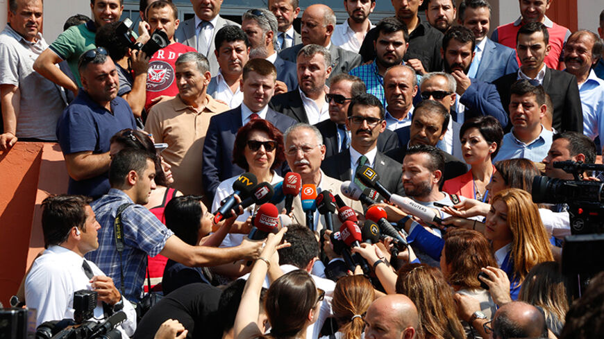 The main opposition candidate in Turkey's presidential election, Ekmeleddin Ihsanoglu speaks after he cast his vote for Turkey's presidential election at a polling station in Istanbul, Turkey, on August 10, 2014. Turks were voting in their first direct presidential election Sunday _ a watershed event in TurkeyÕs 91-year history, where the president was previously elected by Parliament. Prime Minister Recep Tayyip Erdogan, who has dominated the country's politics for the past decade, is the strong front-runn