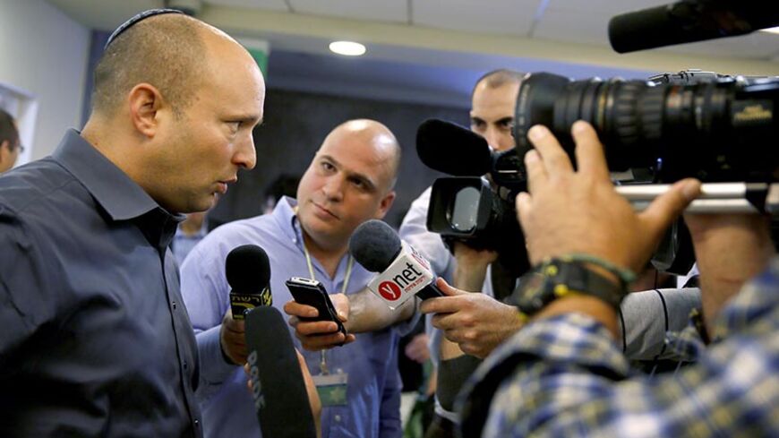 Israeli Economy minister Naftali Bennett arrives to attend the weekly cabinet meeting on April 6, 2014. AFP PHOTO/GALI TIBBON        (Photo credit should read GALI TIBBON/AFP/Getty Images)