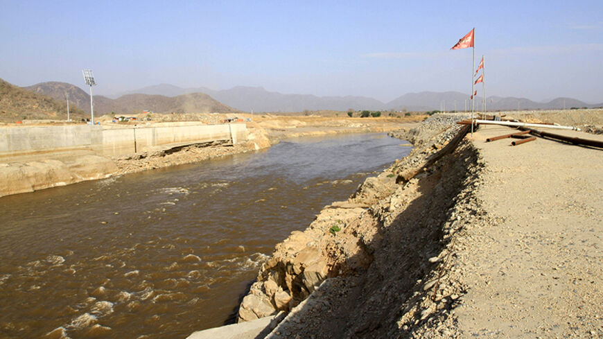 Nile waters flow through the construction site of the Grand Renaissance dam in Guba Woreda, Benishangul Gumuz region March 16, 2014. Egypt fears the $4.7 billion dam, that the Horn of Africa nation is building on the Nile, will reduce a water supply vital for its 84 million people, who mostly live in the Nile valley and delta. Picture taken March 16, 2014. REUTERS/Tiksa Negeri (ETHIOPIA - Tags: ENERGY ENVIRONMENT POLITICS BUSINESS CONSTRUCTION) - RTR3HFSE