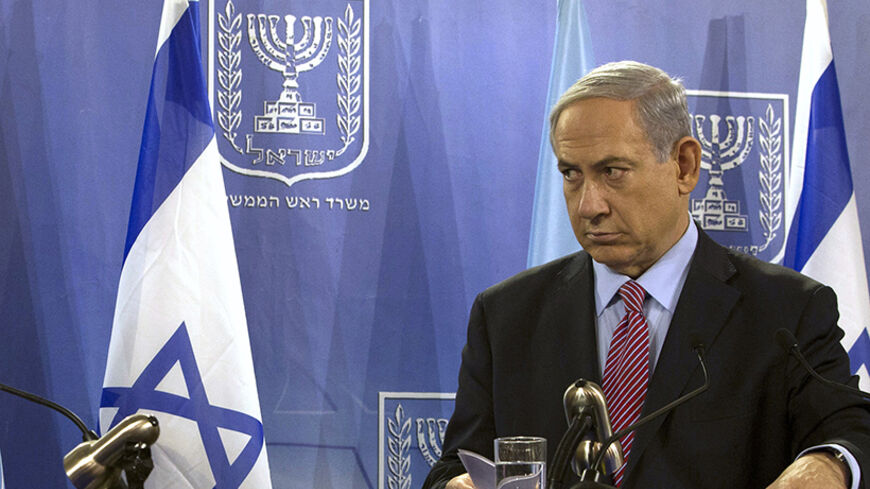 U.N. Secretary General Ban Ki-Moon (L) speaks during a joint news conference with Israeli Prime Minister Benjamin Netanyahu at the Defence Ministry in Tel Aviv July 22, 2014. Israel pounded targets across the Gaza Strip on Tuesday, saying no ceasefire was near as top U.S. and U.N. diplomats pursued talks on halting fighting that has claimed more than 600 lives. With the conflict entering its third week, the Palestinian death toll rose to 603, including nearly 100 children and many other civilians, Gaza heal