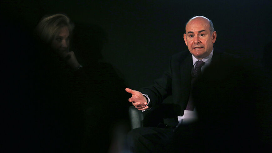 Fitch Chief Executive Officer Paul Taylor speaks during a meeting organised by The Economist in Cascais February 18, 2014. The ratings agency Fitch considers that Portugal's economic and fiscal situation is "moving in the right direction" but it is premature to talk of raising the country's credit rating back to investment grade, Fitch CEO said on Tuesday.  REUTERS/Rafael Marchante (PORTUGAL - Tags: POLITICS BUSINESS) - RTX191TB