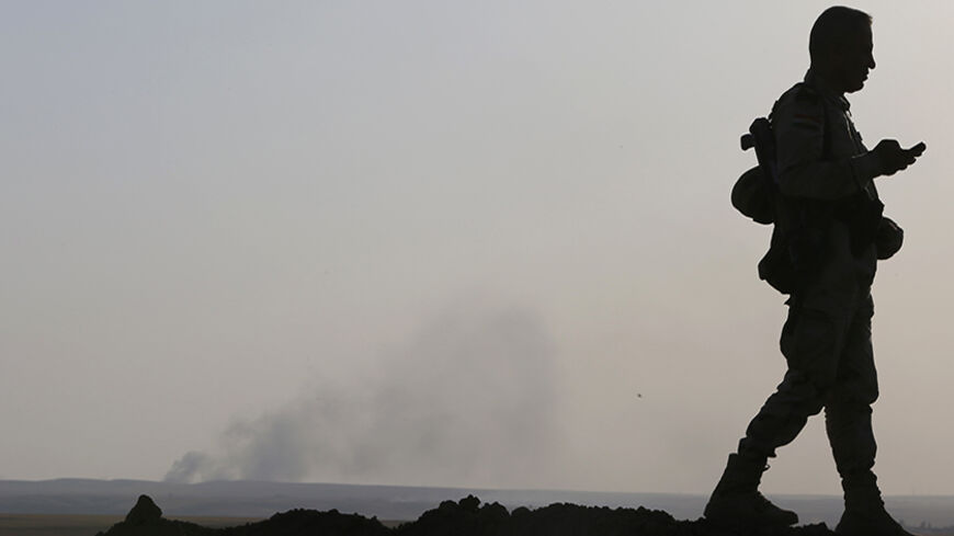 Smoke rises from a recent US air strike on Islamic State (IS) militant positions in Khazir, on the edge of Mosul September 16, 2014. REUTERS/Ahmed Jadallah (IRAQ - Tags: CIVIL UNREST CONFLICT) - RTR46GP6