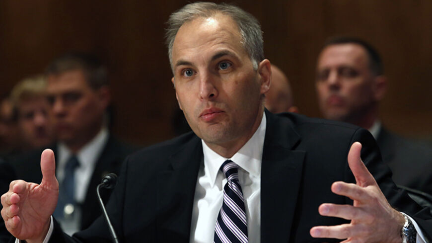 Matthew Olsen, director of the National Counterterrorism Center, testifies before the Senate Homeland Security Committee hearing on "Threats to the Homeland", on Capitol Hill in Washington November 14, 2013. REUTERS/Yuri Gripas (UNITED STATES - Tags: POLITICS CRIME LAW) - RTX15DJ4