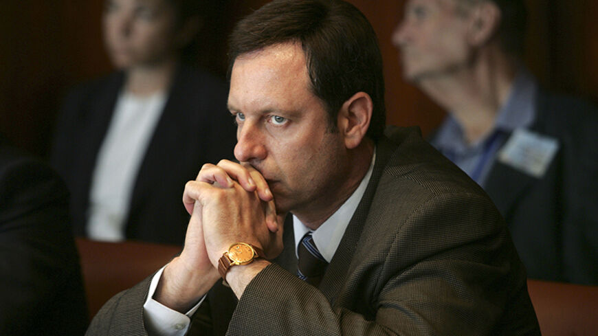 Ophir Pines-Paz, Israeli Minister of Science, Technology, Culture and Sport, attends a cabinet meeting in Jerusalem October 30, 2006. Israeli Prime Minister Ehud Olmert won cabinet approval on Monday for a far-right faction to join the government, a partnership likely to complicate any attempts to revive Israeli-Palestinian peace efforts. Pines-Paz of the Labour party voted against Avigdor Lieberman and his party's inclusion and announced his resignation from Olmert's cabinet in a televised news conference 