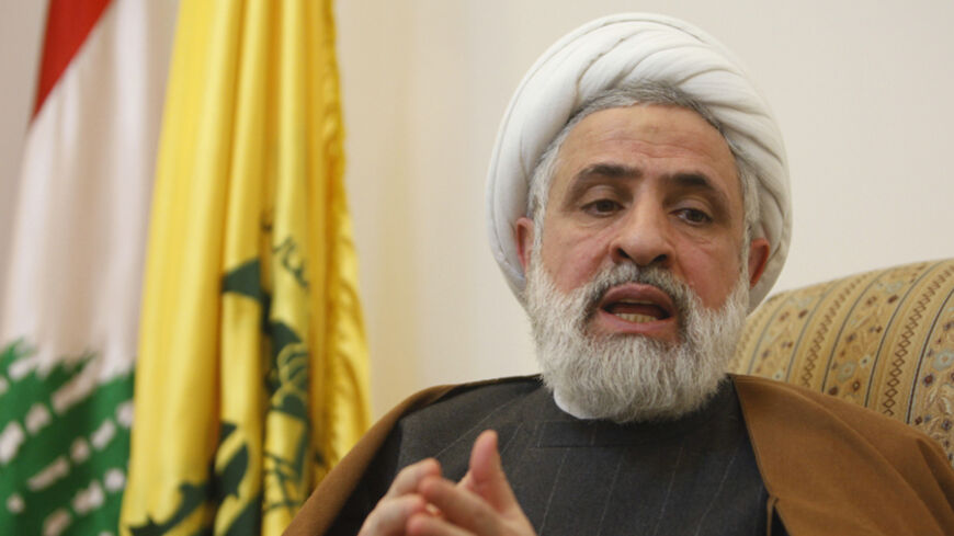 Lebanon's Hezbollah deputy Sheikh Naim Qassem speaks during an interview with Reuters at his office in Beirut's suburbs, February 28, 2012. An Israeli attack on Iran's nuclear programme would set the Middle East ablaze, possibly drag in the United States and unleash a conflict beyond the Jewish state's control, the deputy head of Lebanon's pro-Iranian Hezbollah movement said. Picture taken February 28, 2012. To match interview IRAN-ISRAEL/HEZBOLLAH  REUTERS/ Sharif Karim   (LEBANON - Tags: POLITICS) - RTR2Y