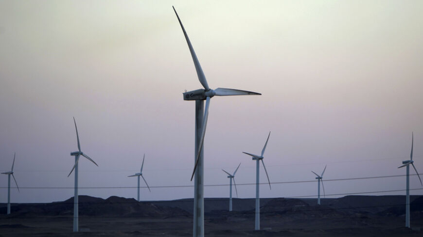 Wind turbines, which generate renewable energy, are seen on the Zafarana Wind Farm, near El Ain El Sokhna port in Suez, 140 km (87 miles) east of Cairo July 6, 2012. Picture taken July 6, 2012. REUTERS/Amr Abdallah Dalsh  (EGYPT - Tags: ENERGY BUSINESS) - RTR34OHM