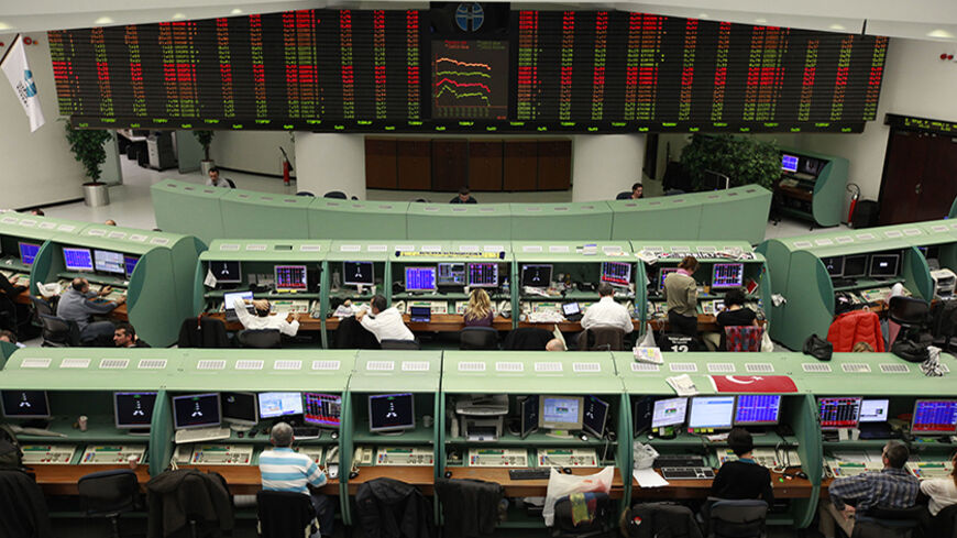 Traders work during the afternoon session at the Stock Exchange in Istanbul November 22, 2012. REUTERS/Osman Orsal (TURKEY - Tags: BUSINESS) - RTR3AQKN