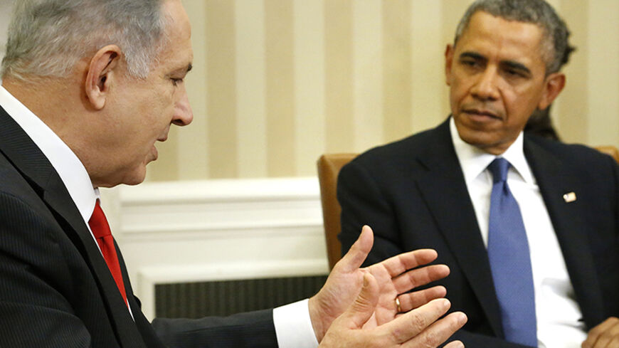 Israel's Prime Minister Benjamin Netanyahu (L) makes remarks as he meets with U.S. President Barack Obama in the Oval Office of the White House in Washington March 3, 2014.   REUTERS/Jonathan Ernst    (UNITED STATES - Tags: POLITICS) - RTR3FZZ2