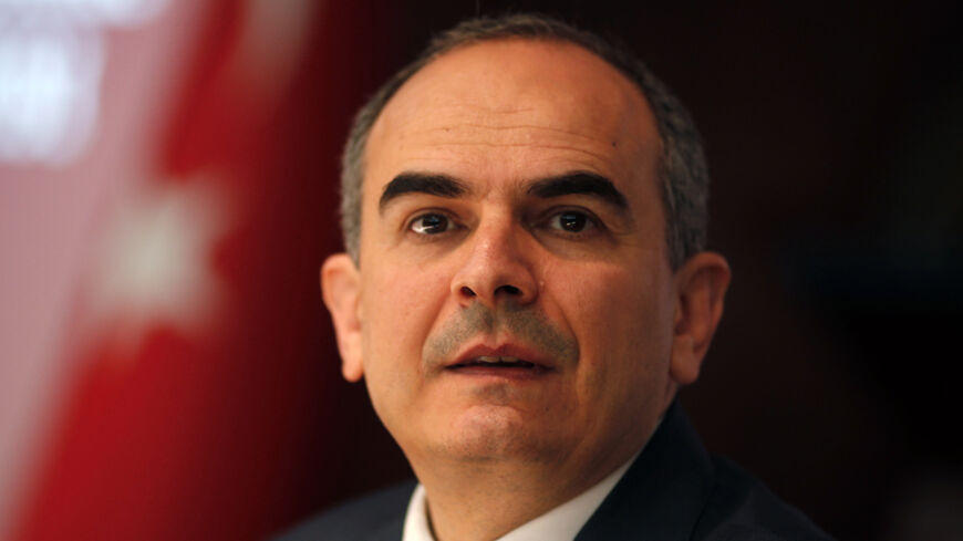 Turkey's central bank governor Erdem Basci addresses the general assembly of the bank in Ankara April 17, 2014. Turkey's current account deficit to gross domestic product (GDP) ratio was expected to be between 5-6 percent at the end of 2014, Basci said on Thursday.   REUTERS/Umit Bektas (TURKEY - Tags: POLITICS BUSINESS HEADSHOT) - RTR3LO49