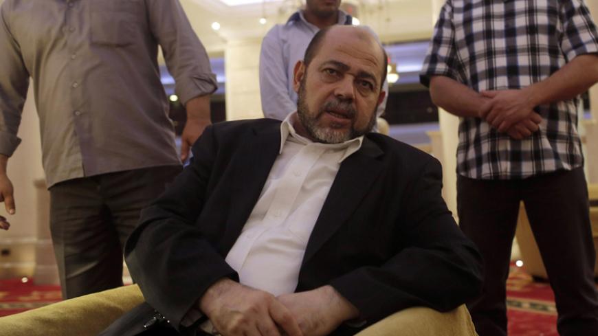 Deputy chairman of Hamas' political bureau Moussa Abu Marzouk talks during an interview with Reuters in Cairo, August 9, 2014. Palestinian negotiators will leave Cairo on Sunday unless Israel agrees to return to Egyptian-mediated negotiations to end the war in Gaza, senior delegation member Marzouk said.         REUTERS/Asmaa Waguih (EGYPT - Tags: POLITICS CONFLICT) - RTR41TT5